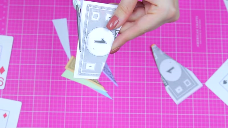 Step 3: Attach the bills to the string